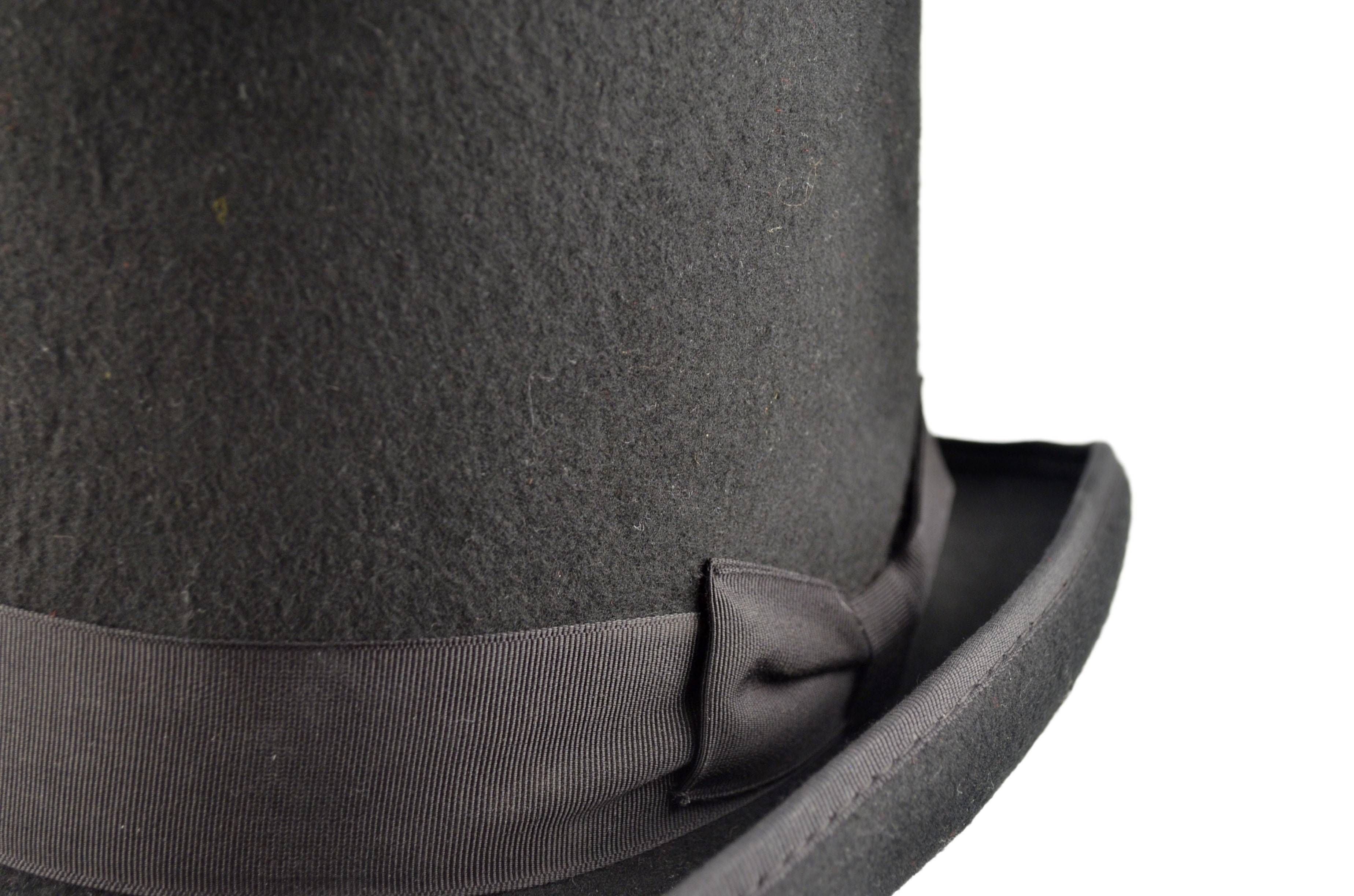 Very Tall Top Hat- Handmade Satin Lining Wedding Hat
Luxurious 100% wool felt Very Tall Top Hat. 20cm height, satin lined. Black or Brown, sizes S-XL. Perfect for weddings, funerals, daily wear. Handmade quality. Hat Details: Style: Very Tall Top Hat Material: 100% Premium Wool Felt Height: 20cm Colors: Black, Brown Sizes: S, M, L, XL Craftsmanship: Handmade, unmatched.